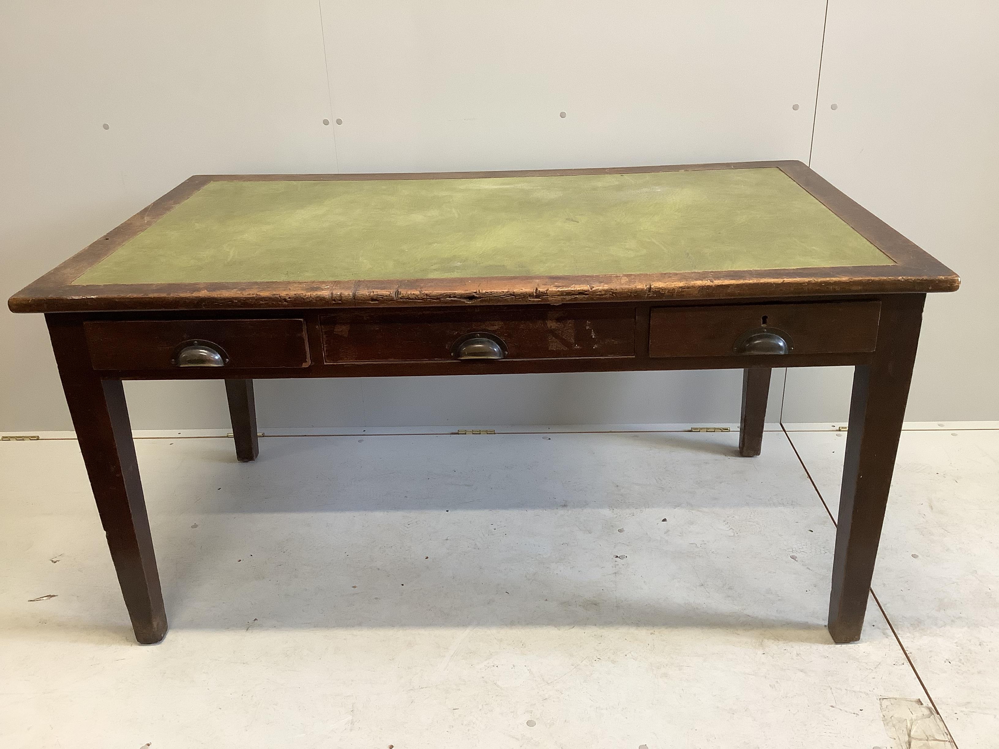 A mid century government issue Air Ministry three drawer writing table, stamped AM and a crown, width 153cm, depth 92cm, height 77cm